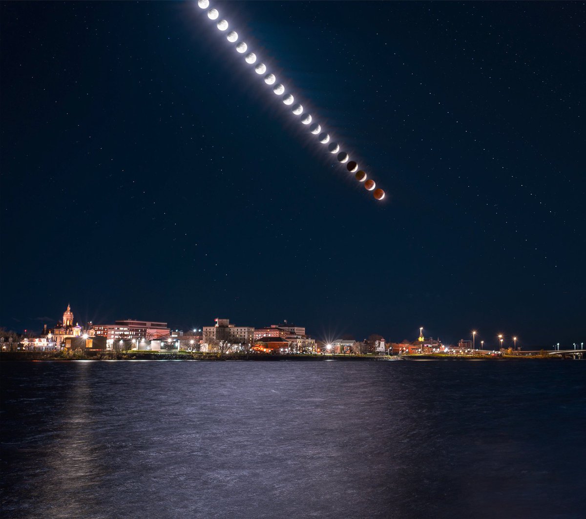 The November 8th lunar eclipse over downtown Fredericton, NB. 
🌕🌔🌓🌒🌑

#lunareclipse2022 #explorefredericton #explorenb