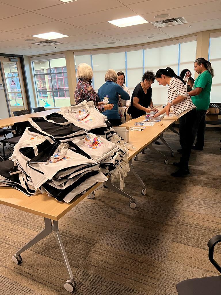 BCNPHA's tweet photo. Preparation for the 2022 #HousingCentral Conference is well underway! It takes teamwork to stuff all of the delegate tote bags we'll be handing out. https://t.co/ltp4hvFVsX