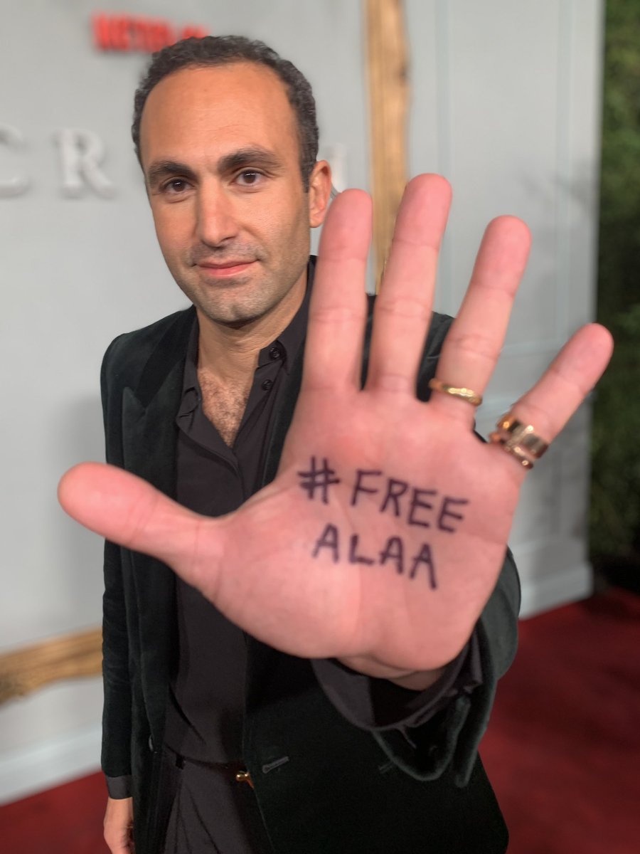 At #TheCrown premiere with this on my hand because we need @FreedomForAlaa, who is on hunger strike in prison and may die any day now only because he makes us believe that a better world is possible. #Cop27 #FreeAlaa