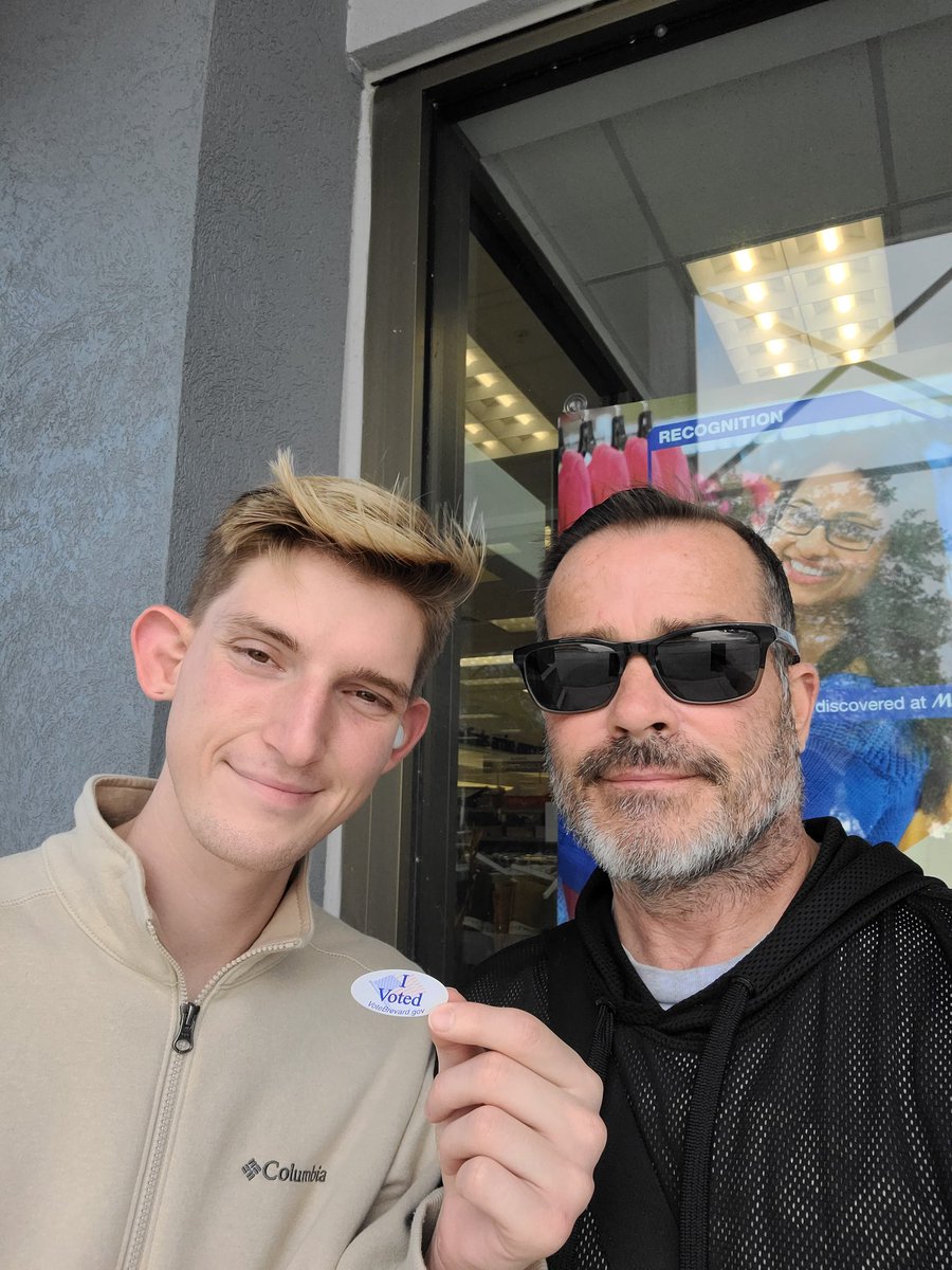 ChanceyRon's tweet image. We voted even during high winds due to the incoming hurricane! Blue all down the ballot.