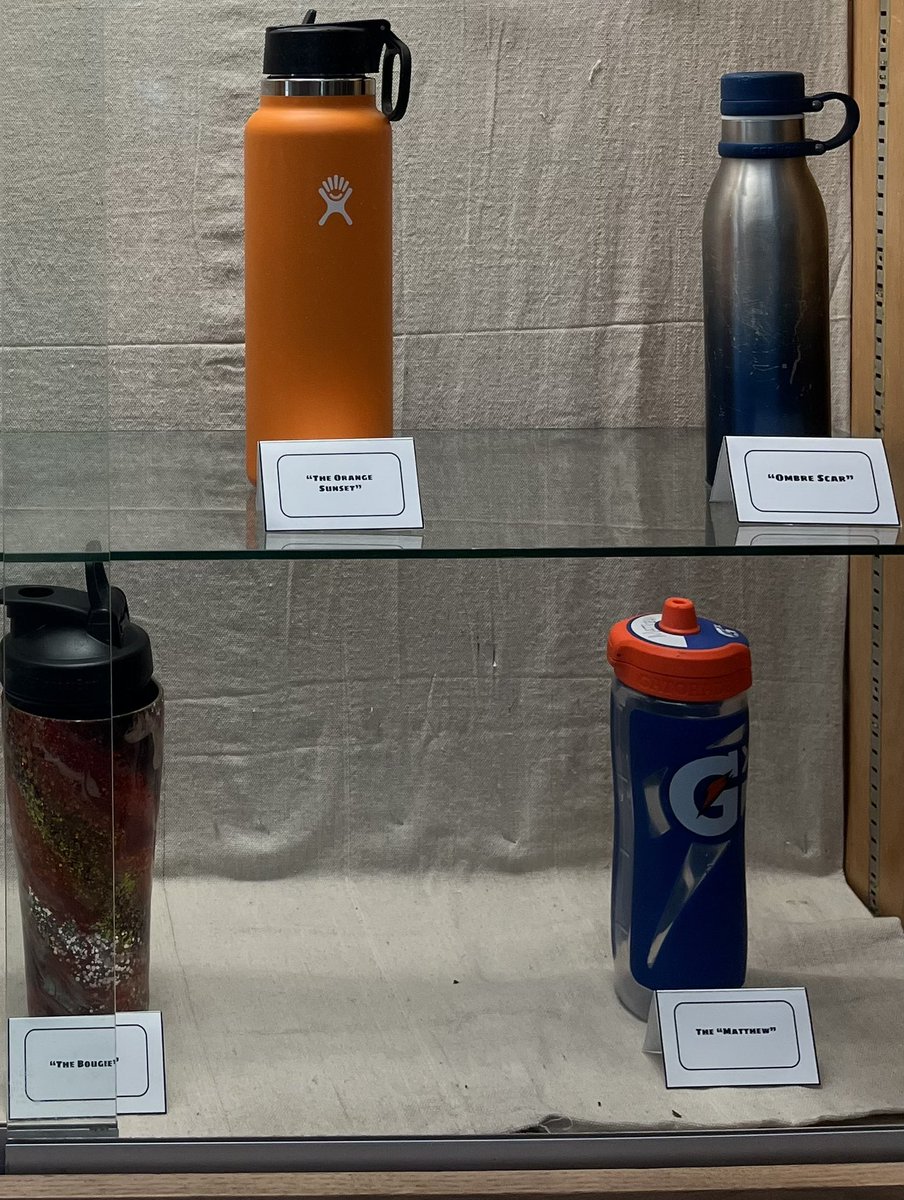 RivasReadsalot's tweet photo. I went to the front office today and noticed that there were LOTS of water bottles in lost and found. Then I remembered the display that Kent District Library did and decided we had to follow suit! We present “Lost Water Bottles of Clark Middle School” display. @ClarkMSCougars https://t.co/XNxhaZ2JoX