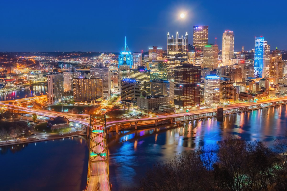 DaveDiCello's tweet photo. I've seen a LOT of different views of #Pittsburgh. But before 2 hours ago, I had never seen this one. An amazingly kind couple saw me running down Grandview, trying to capture the moon between the houses and invited me to capture the view from their home. And what a view it is. https://t.co/bQxNbhNHuB