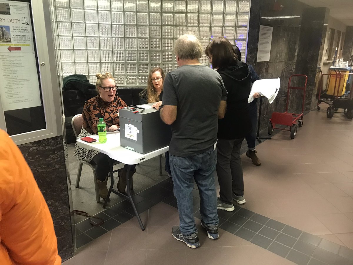 The first precinct ballot boxes arrived at the Minnehaha County Administration Building.  Local Scouts help offload the boxes which then go to the third floor for counting.