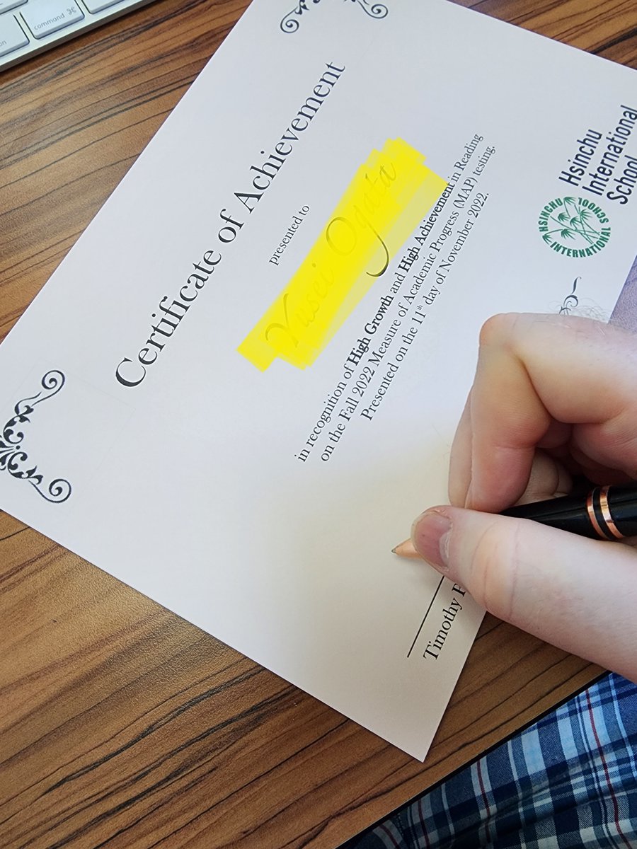 Signing certificates for students who showed high growth and high achievement on the fall MAP assessment!