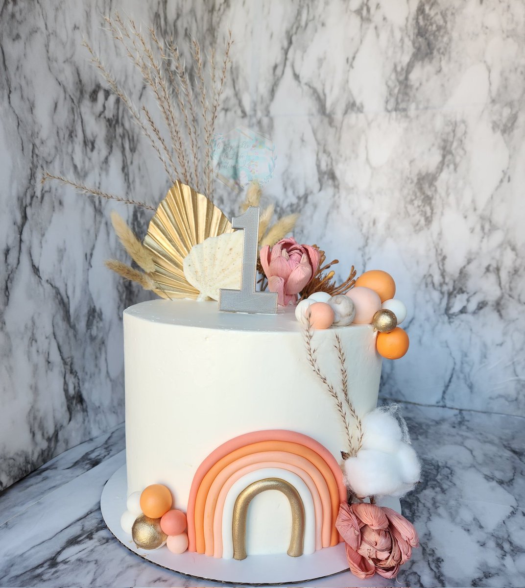 How cute is this custom 1st birthday cake?! 3d printed #1 #customcake #bohocake #chic
