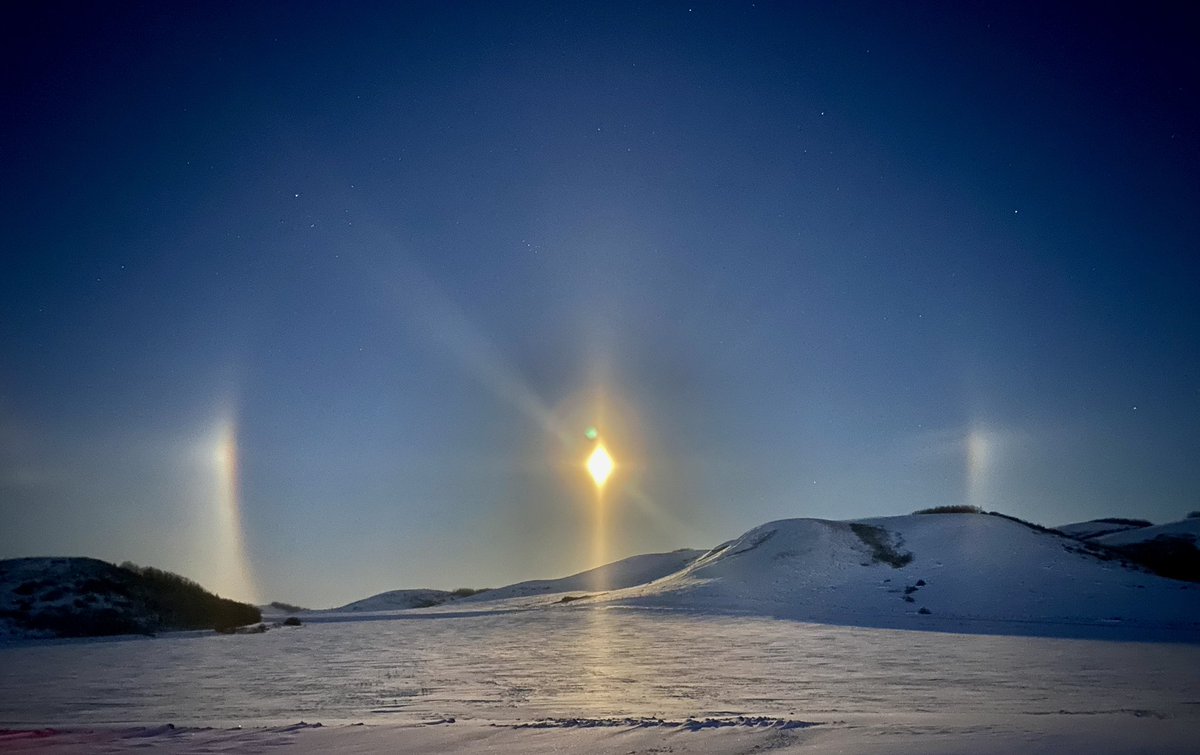 This is actually the moon at 631am yesterday November 8th north of Consort AB in the Neutral Hills off Highway 41.  If they’re ‘Sun Dogs’ when around the sun, then I guess these are ‘Moon Dogs’.  Of course only had my phone…