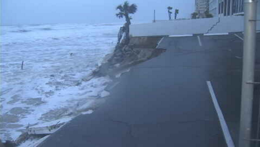 RustyMcCranie's tweet photo. Daytona Beach Shores. First image at 6:30am. Second image 7:45am. Concrete wall and parking spaces crumbling as wave action pummels the coast at high tide this morning. And onshore winds will continue the next 48 hours. Coast left vulnerable after Ian. https://t.co/a7cOQLLn2H