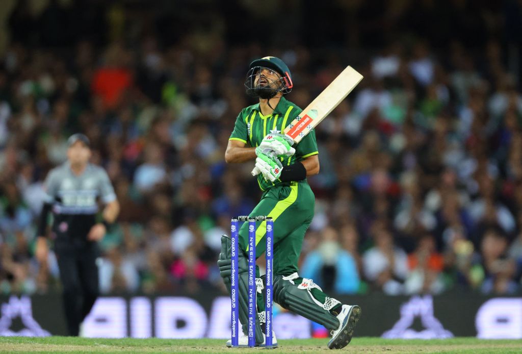 ICC's tweet photo. Babar Azam falls and New Zealand get a late breakthrough 👀

#T20WorldCup | #NZvPAK | 📝: https://t.co/LSzHXLy12f https://t.co/cCpFUpHy4J