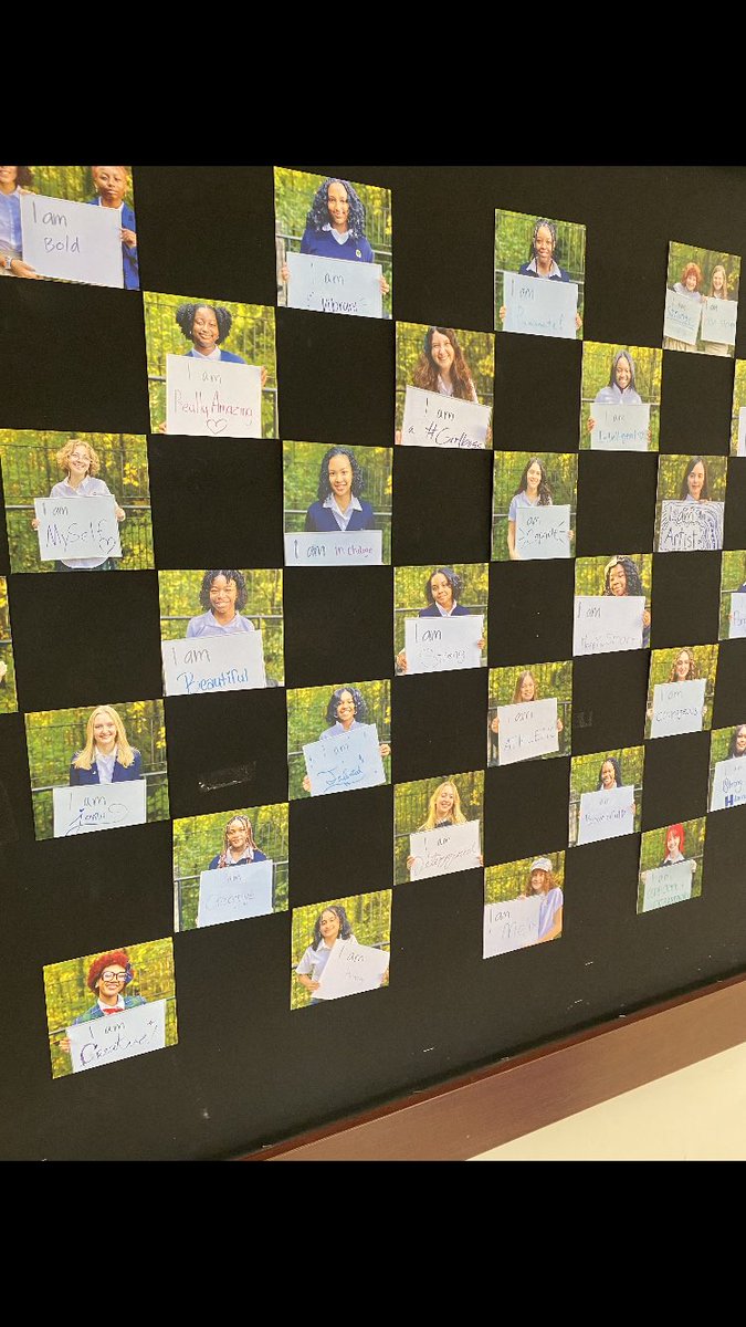 Checking out our new “I am” bulletin board.