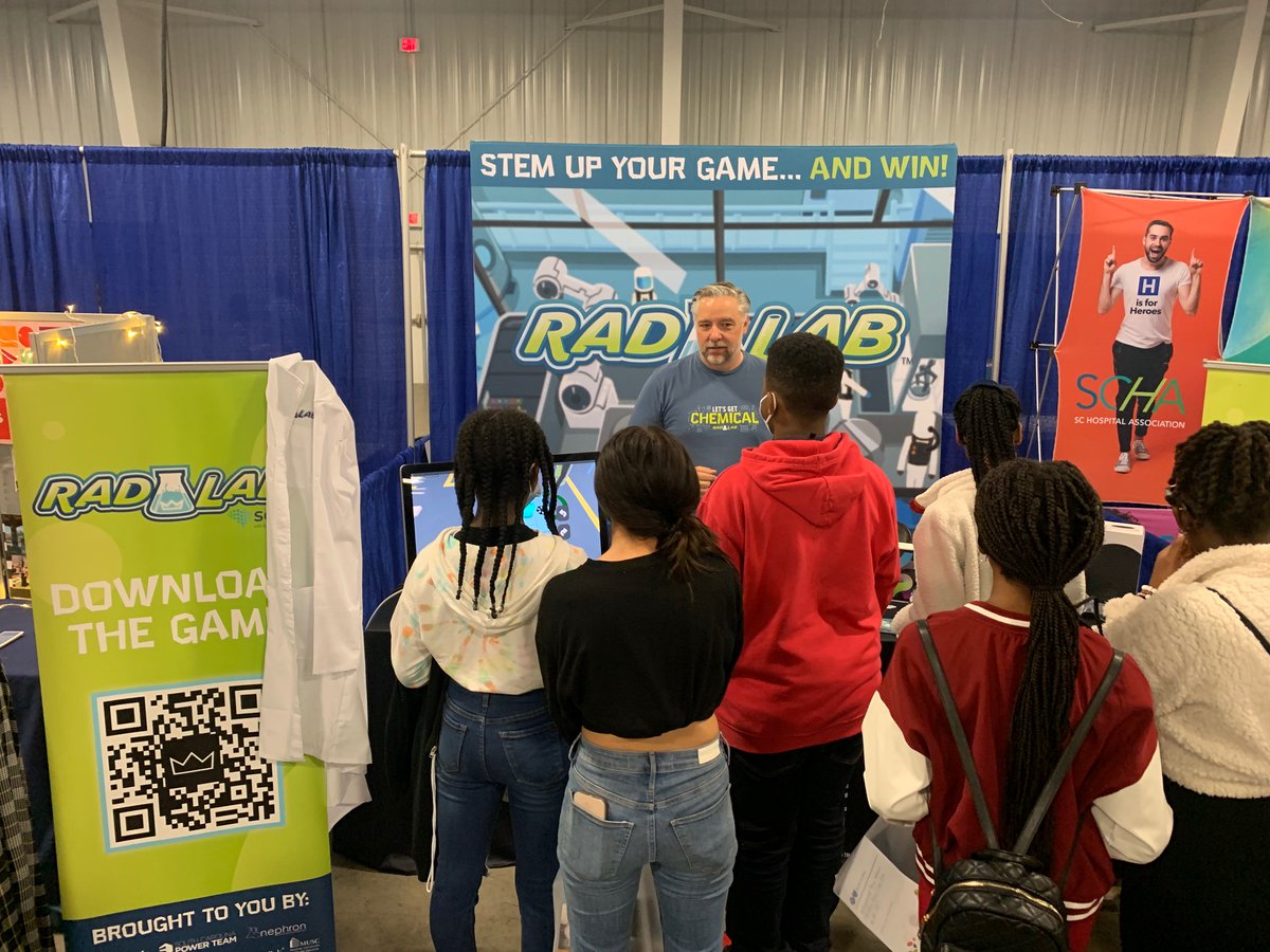 SCBiotech's tweet photo. It's been a busy fall spreading the word about #RadLabSC at career fairs. All smiles and excitement for these middle schoolers when they learned they might win cool prizes just by playing the game! #workforcedevelopment #sceducation #gamechanger https://t.co/2dfwtZ6WDJ