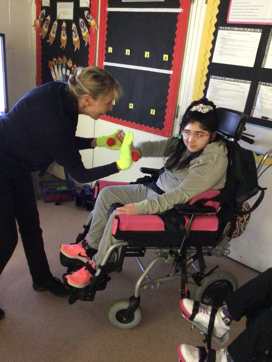 Fairfieldstweet's tweet photo. During #PositiveLooking Week the students in F2 want to show you the resources we use to help us focus on our activities. We use dark backgrounds, bright gloves and yellow objects to attract our attention. https://t.co/mtbkmmXAxI