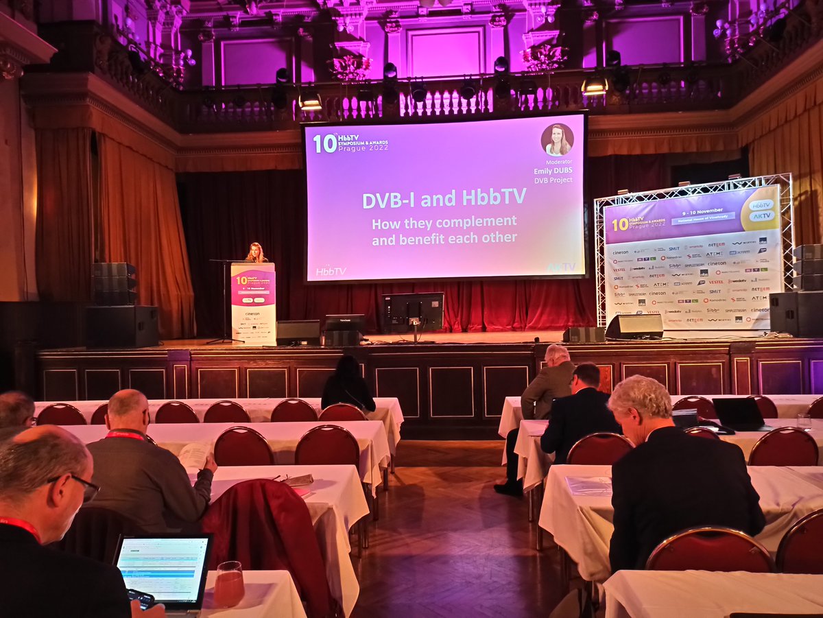HbbTV_official's tweet photo. Emily Dubs, DVB, opens the panel on #DVB-I and #HbbTV, and introduces the speakers. Watch the live-stream at https://t.co/DfyOgVrrx9. @DVB_Project #HbbTVPrague https://t.co/X9DU9Z5p4o