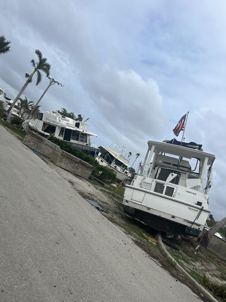regulatorjmm's tweet photo. With #HurricaneNicole coming, I just want to remind everyone that Ft Myers still needs your prayers. Today was my first time being downtown since #HurricaneIan hit and itโs devastating. Thereโs already a memorial to the over 100 victims #SWFLstrong #prayforFL https://t.co/hxia85KvC2