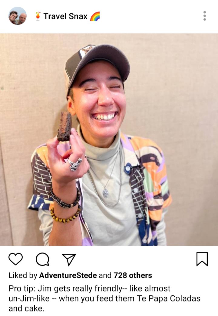 Lucius' IG: Picture of Jim smiling and laughing. Caption reads "Pro tip: Jim gets really friendly -- like almost un-Jim-like -- when you feed them Te Papa Coladas and cake."