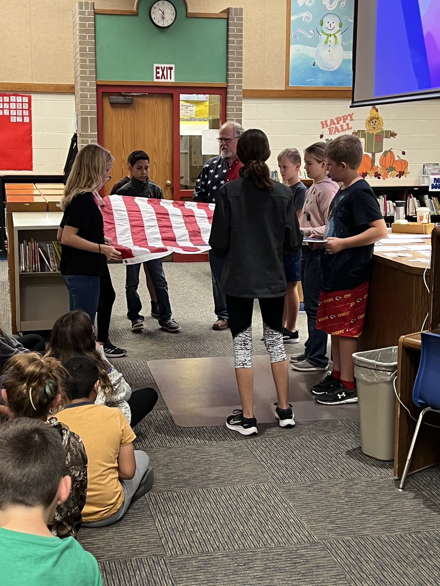 ReinhardtDerek's tweet photo. NCES students learned Flag Etiquette today from Mr. G as part of our veterans programs this week @USD303 https://t.co/5ogAB7r65g
