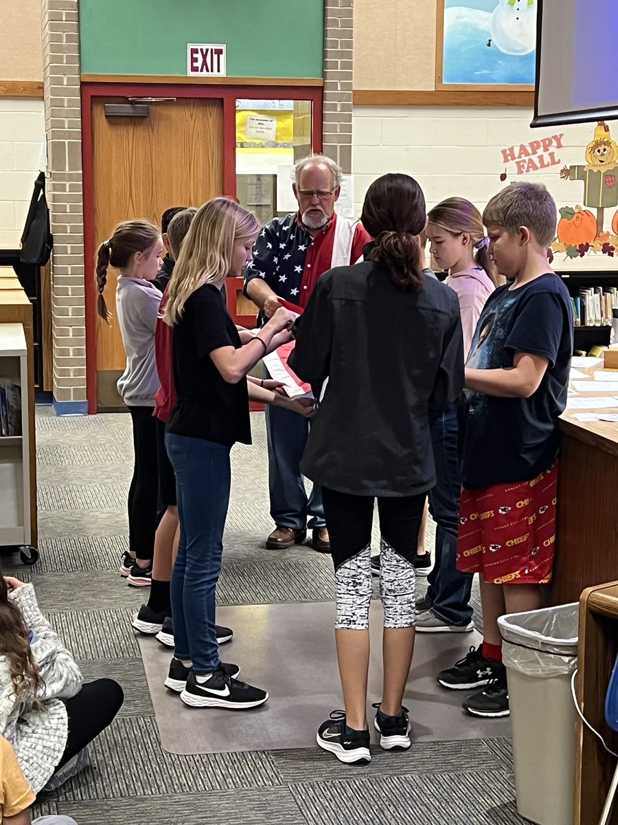 ReinhardtDerek's tweet photo. NCES students learned Flag Etiquette today from Mr. G as part of our veterans programs this week @USD303 https://t.co/5ogAB7r65g