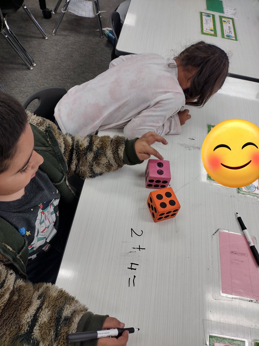 Kinders practicing addition with a partner using dice. Makes math so much more fun!!! <a href="/Columbia_VVUSD/">Columbia Elementary</a>
