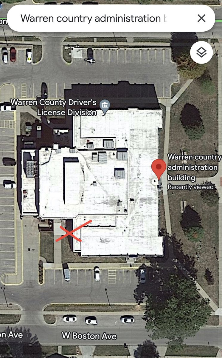 mamaerickson's tweet photo. @IowaSOS @IowaSOS the red X shows the door she opened at 7:00PM after being told she has to accept the ballots. Again off a loading dock, not a traditionally used entrance and no signs were posted where to enter on the regular entrance doors. https://t.co/r7xH7noQUg