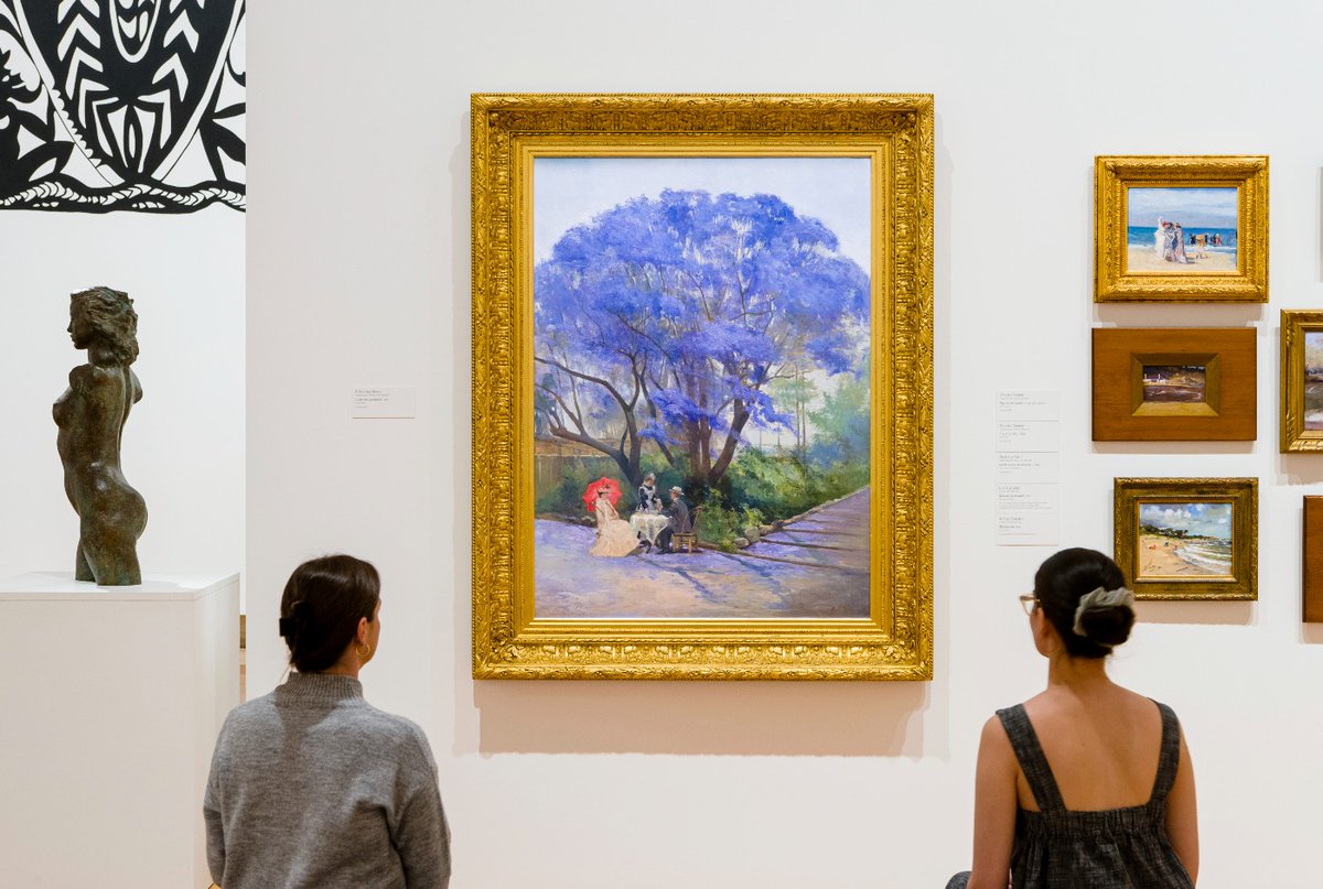 QAGOMA's tweet photo. Lose yourself in the glowing purple hue of 'Under the jacaranda' 1903 by R Godfrey Rivers. 🌸

We've placed a comfy seat in front of the painting, so you can settle in and stay a little longer. 

On display now in the Australian Art Collection, QAG. Free entry. 

#AusArtQAG https://t.co/2pa56o1cV9