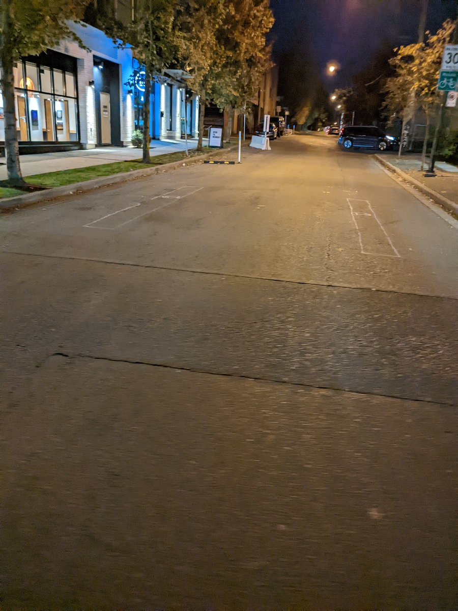 CAHiggins's tweet photo. Seeing these paint outlines on a #slowstreet in east Vancouver, I am wondering if we are going to see some more permanent infrastructure? Would be great to see some #concrete. Layout look like it would allow bikes on both sides and one vehicle as big as an 18 wheeler in center! https://t.co/ArCGVwefuz