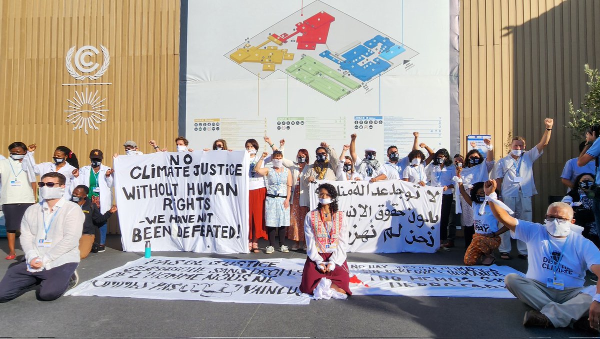 NOW: #COP27 participants hold a silent protest calling for #HumanRights and #ClimateJustice. In the context of Egypt which has detained 100s of prisoners of conscience and restricted civic space and protest, demands for human rights have been front and center at COP. #FreeThemAll