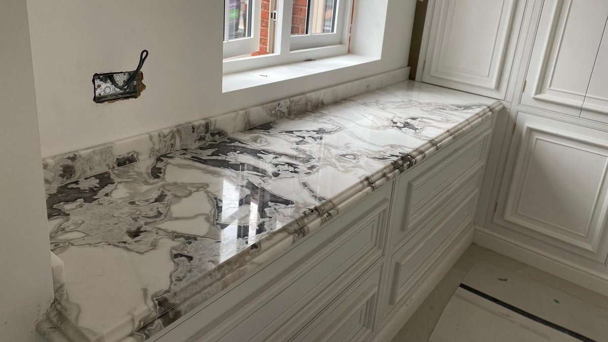 Check out this job we've done in Dover White Quartzite, it's absolutely gorgeous.
Order a sample or get a quote! 
mykitchenworktop.co.uk/product/dover-…