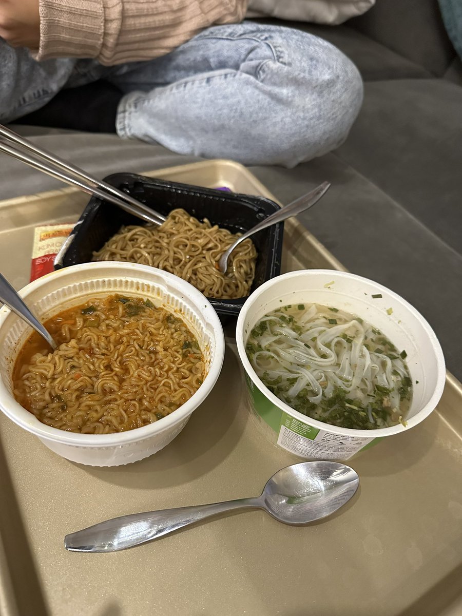 Two girls. Three cups...of noodles.