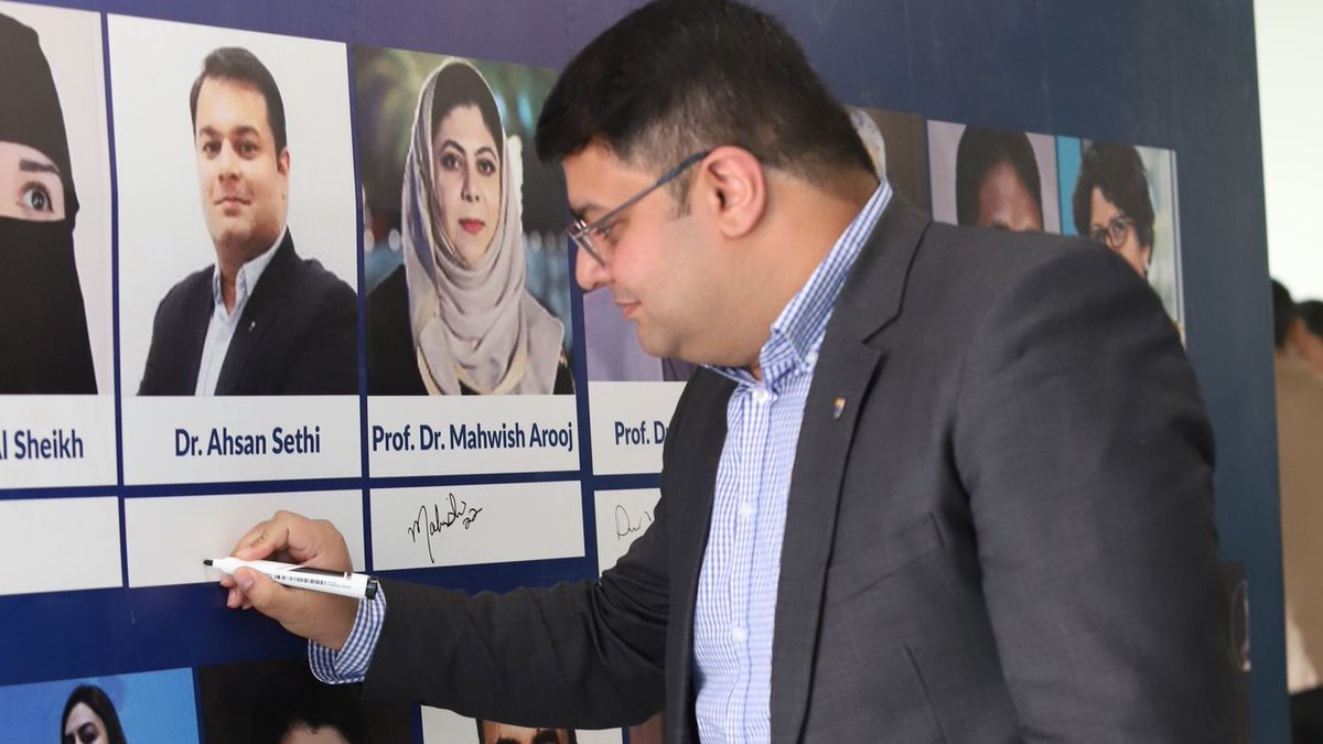 ICHPEofficial's tweet photo. Keeping up with traditions, ICHPE speakers marked their presence on the Signature Wall. 
All the national &amp; international speakers signed under their pictures &amp; thoroughly enjoyed this activity. 
@hbaloch @drahsansethi @AroojMahwish 
#UCMD #uol #ichpe22 #ICHPE https://t.co/ubXKhu8RqD
