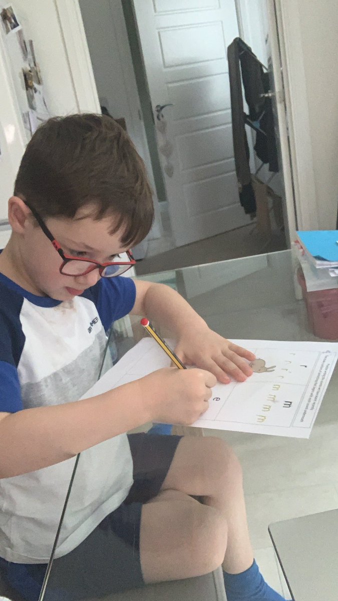 The wee dude is off school sick and working alongside me at the table 😂 <a href="/MissMacfarlane3/">Miss Macfarlane</a>