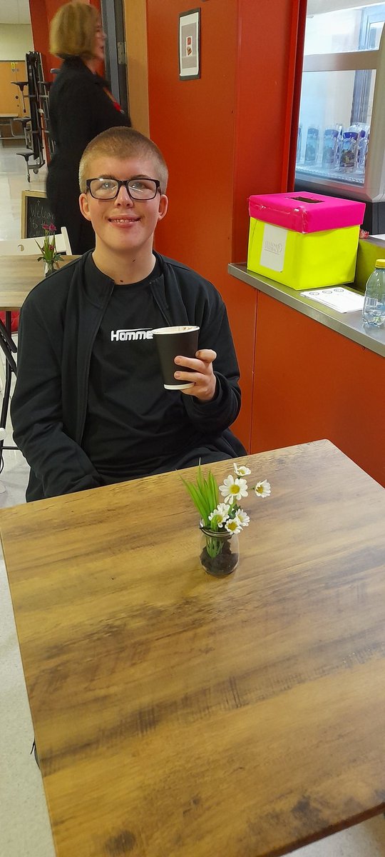 EASN's Alix being trained at the Coffee Hub and Robert enjoying a cuppa!