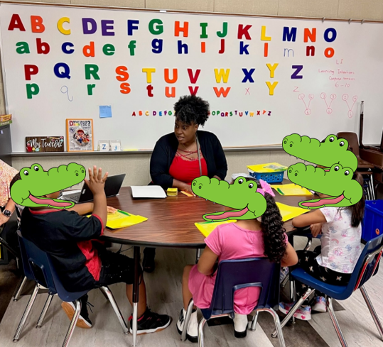 The amazing Ms. Bell RELA Coach is providing intervention to our gators. #Rise&amp;Shine