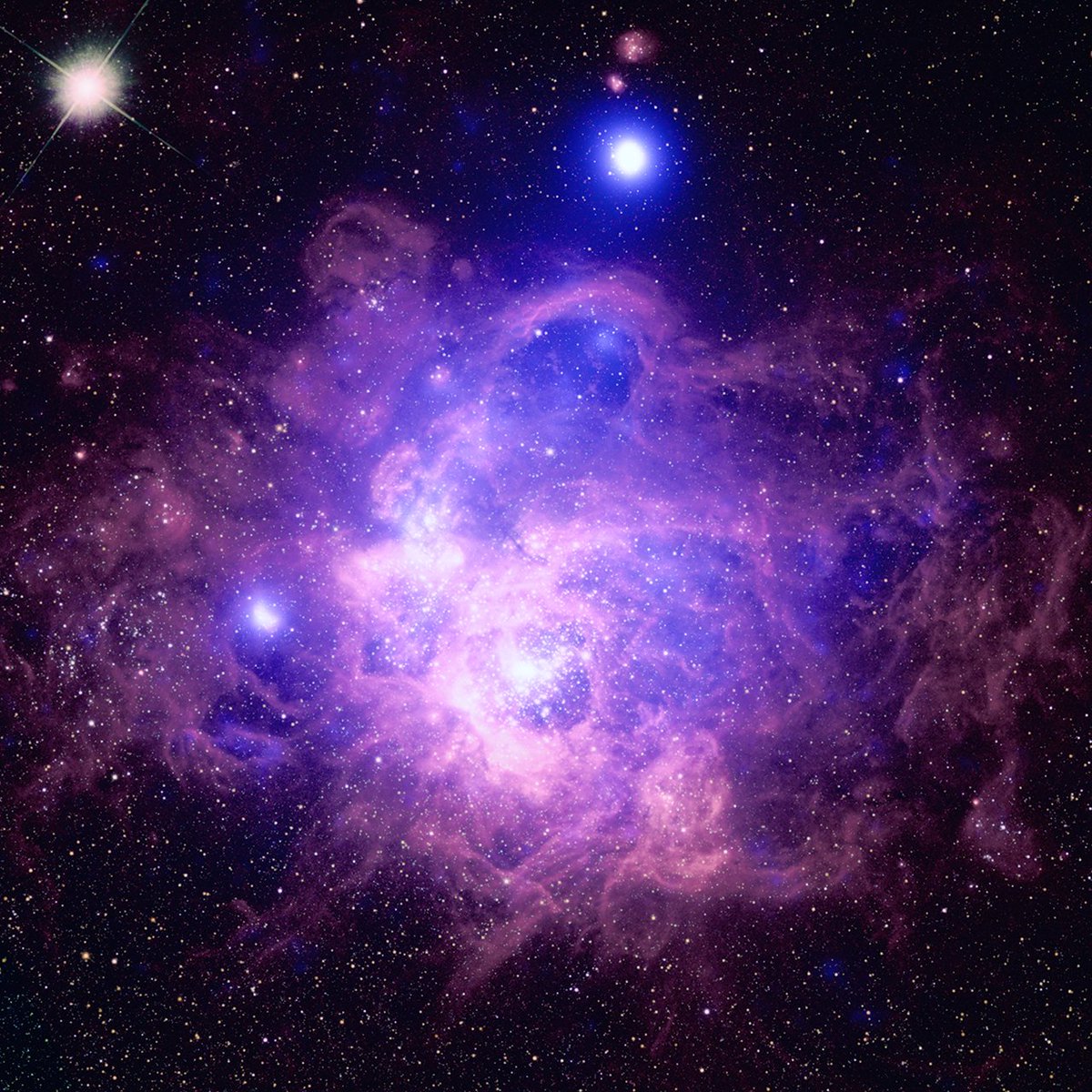 NGC 604 is a star-forming region tucked away in one of our neighboring galaxies, M33. Home to approximately 200 hot, young, massive stars, NGC 604 is located about 2.7 million light-years from Earth. This image spans about 2,700 light-years from side to side.✨