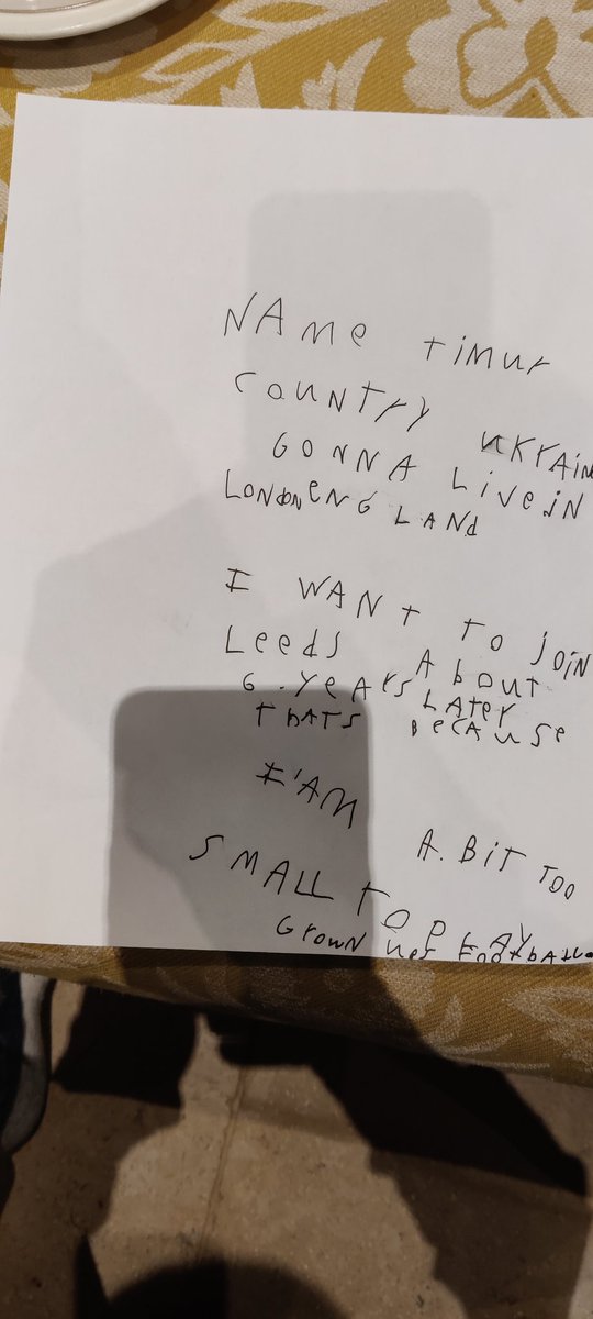 Alqueenie3's tweet photo. @LUFC My Ukrainian Guest Timur (6) wants to play football for Leeds when he is bigger. He arrived with no English 6 months ago but has written himself a contract with Leeds. Tomorrow he is having a 7th bday party with a Leeds cake, blue and yellow decorations 🎉🎂🤣 https://t.co/zCo5k2j16L