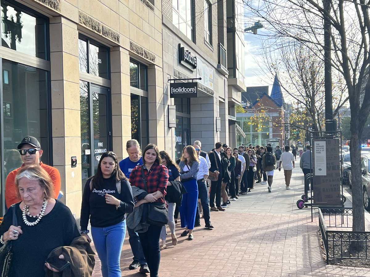 cmclymer's tweet photo. The line to see Pres. Biden and VP Harris at a midterm victory rally at Howard Theatre here in D.C. — which doesn’t even start for two hours — is all the way back to the Shaw/Howard U Metro. It’s the middle of the workday. The enthusiasm is real. https://t.co/hkou29Soky
