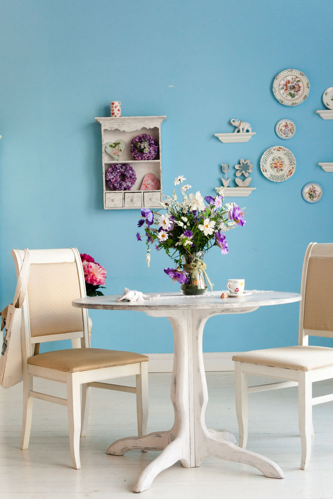 This is a very elegantly designed dining room. The baby blue wall looks great against all the white pieces in the room. Keeping a fresh bunch of flowers in the house will make any room brighter and more cheery.

Chris Wezel
VP Commercial Lending
m...