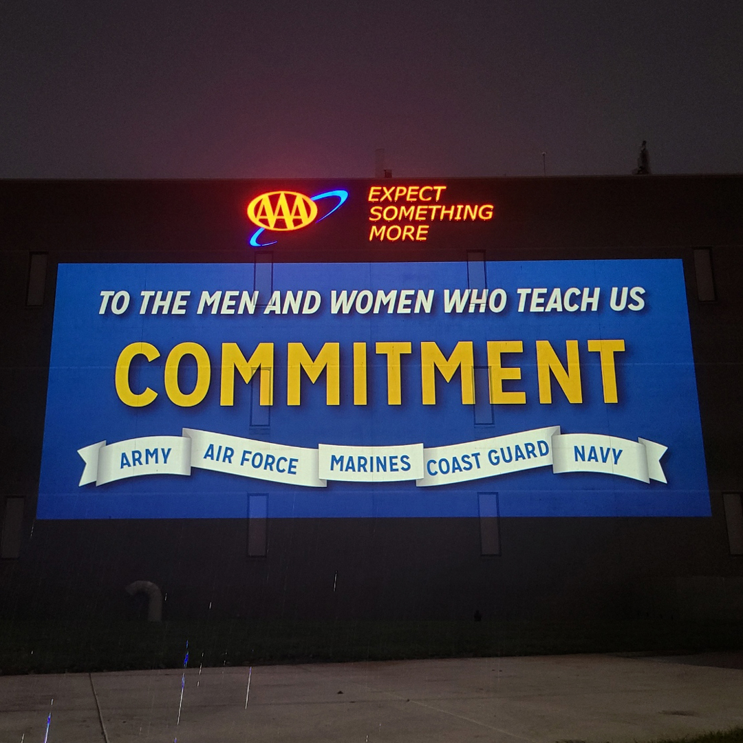AAACarolinas's tweet photo. AAA thanks all the brave men and women who have served this county. This #VeteransDay, we are lighting up our Michigan HQ to salute you all. Thank you for your service. #WeAreAAA https://t.co/6i6HVJsFYw