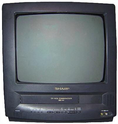 ComputerLove_'s tweet photo. When your TV had a built in VHS player. https://t.co/YtDz0War2f