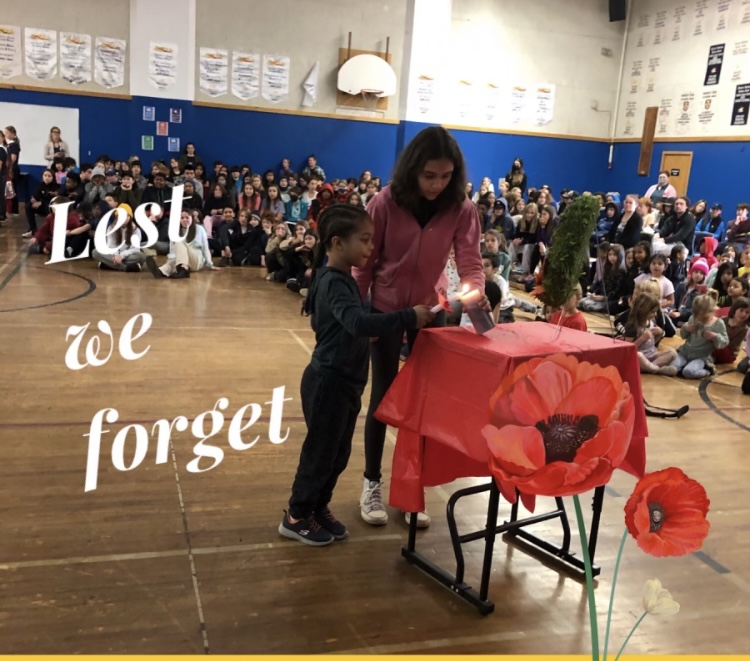 BIHI_School's tweet photo. A beautiful assembly for #remembranceday2022! Well done, BiHi! Thank you for the incredible leadership and teaching from @WendyDriscoll22, to our amazing students for their passionate tribute, and for all of the hard work! #LestWeForget 
@HRCE_NS https://t.co/6K5S04p1P2