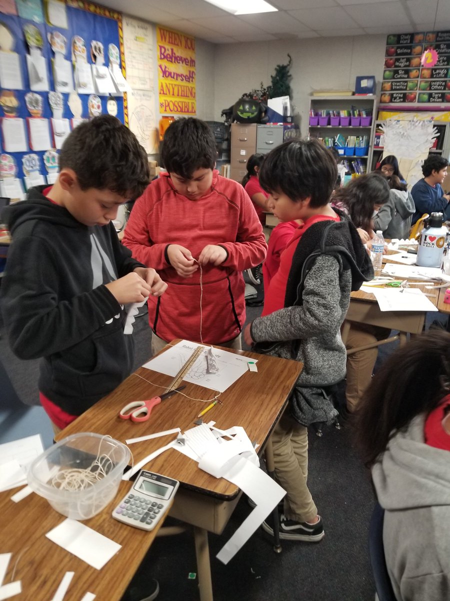 Rorimer scientists creating a robotic hand.