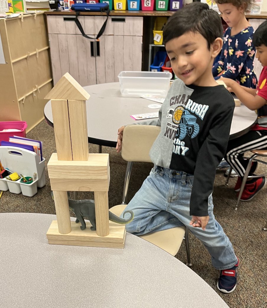 We used our 3d shapes to build homes for our dinosaur together in math class today.