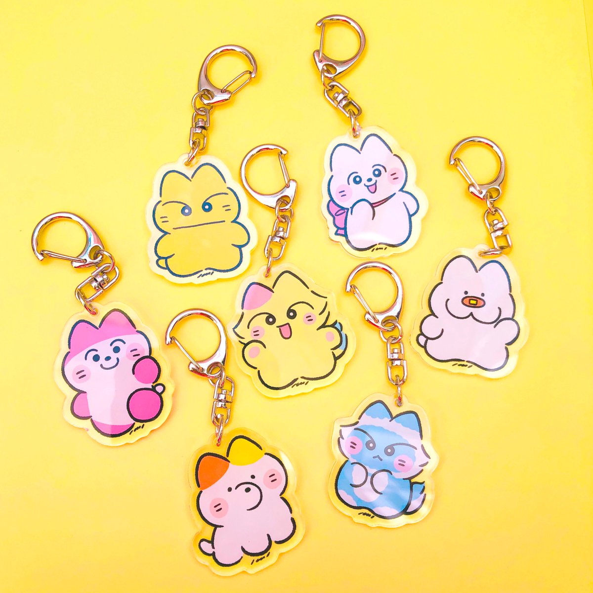 「NEW GOODSにゃお〜んアクリルキーホルダー(7種)・きいろいねこ・ふさふさ」|いち🌷のイラスト