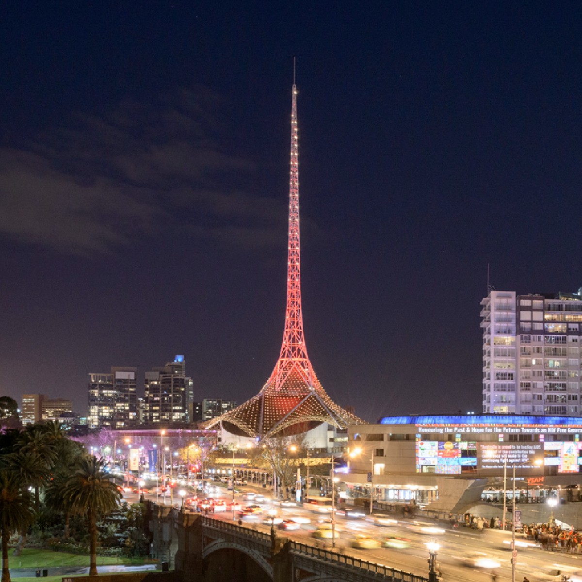 artscentremelb's tweet photo. Lest we forget. Our spire is lit red tonight to honour and remember armed forces members who have died in the line of duty. #RedToRemember https://t.co/ZeQ7UUIgbS