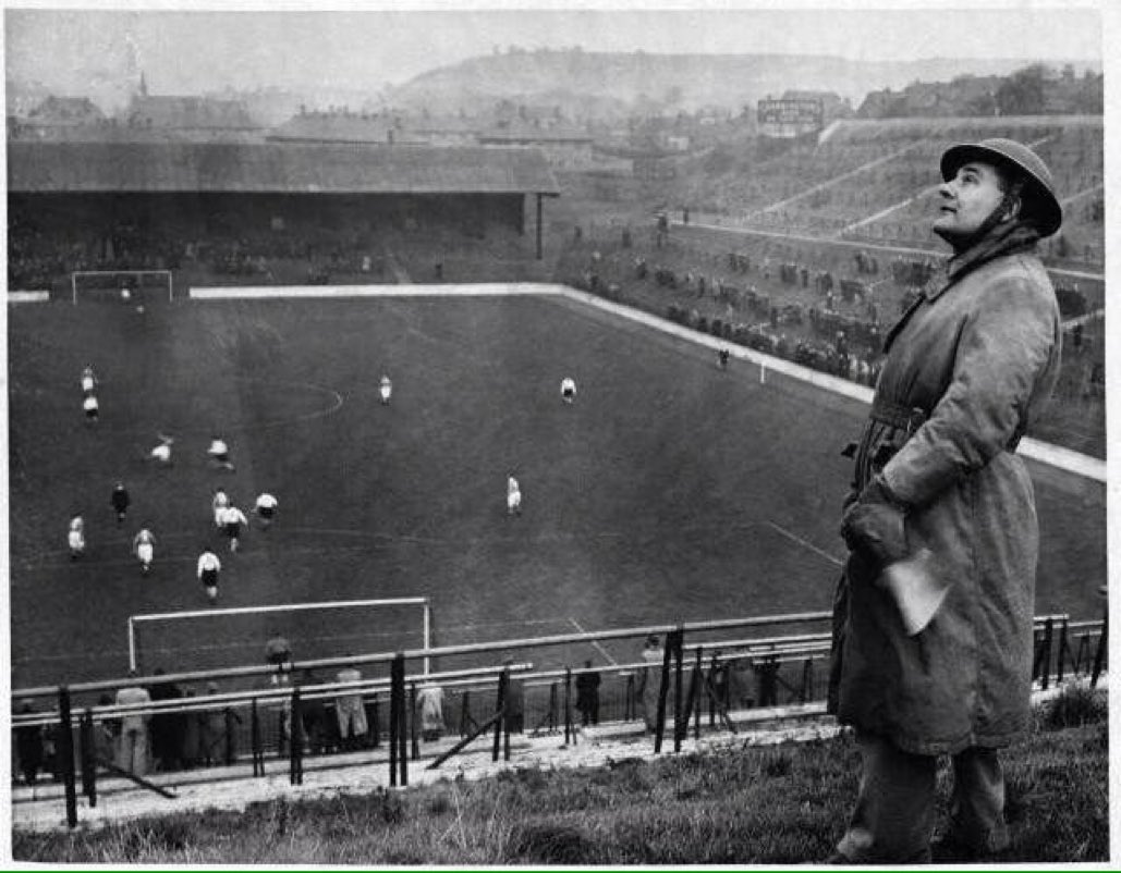 A spotter watches out for German air raids at The Valley as Charlton take on Arsenal in 1940 #LestWeForget #ArmisticeDay