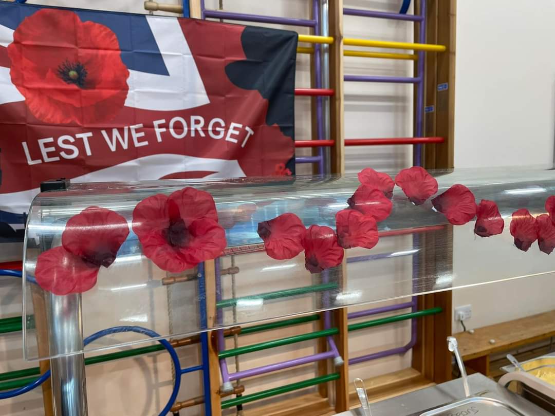 PindersPrimary's tweet photo. Remembrance Day lunchtime display today, with poppy shaped shortbread biscuits. #PPBritishValues #PPCommunity https://t.co/hDpVQAMOIX