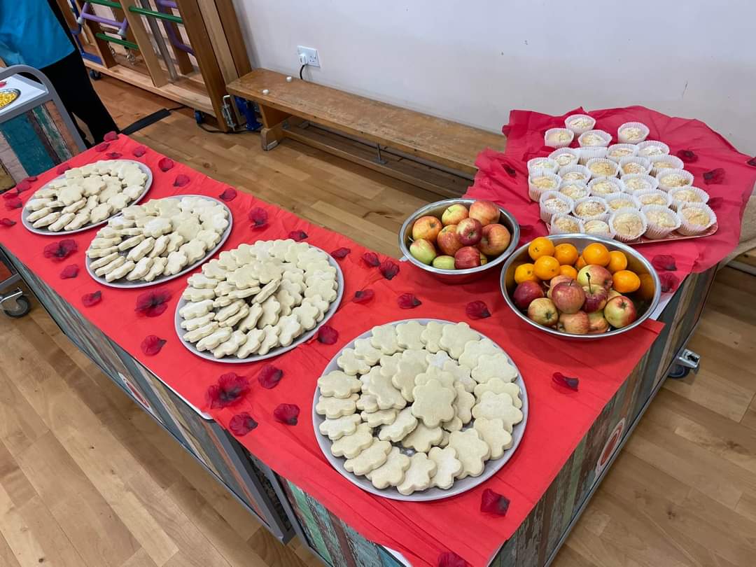 PindersPrimary's tweet photo. Remembrance Day lunchtime display today, with poppy shaped shortbread biscuits. #PPBritishValues #PPCommunity https://t.co/hDpVQAMOIX