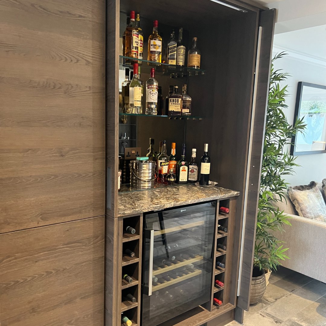 Kensingtonscott's tweet photo. Take a look at our recent kitchen installment, complete with handless cupboards, an entertainment centre, and a hidden drinks cabinet 🍸 https://t.co/OTRil08qBA