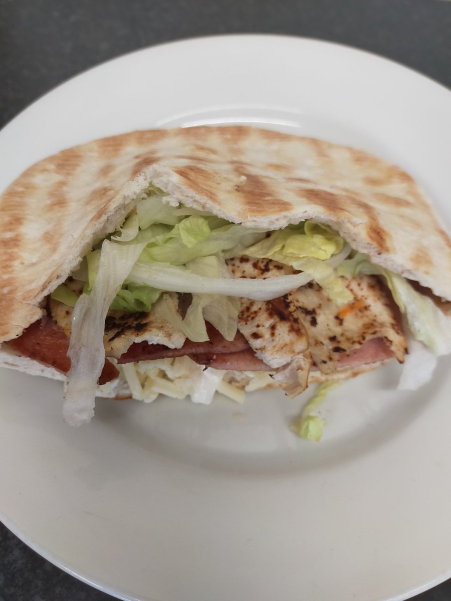 ButtysStAnnes's tweet photo. We've now added pitta breads to our menu. Served here with Chicken, Bacon, Cheese and Coleslaw. https://t.co/izGfJ0YxtV