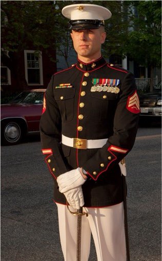 Braves's tweet photo. Tyler Holley, a Corporate Partnerships Coordinator, served 8 years in the U.S. Marine Corps.  
Stationed out of Camp LeJeune, deployed twice to Afghanistan, &amp; in DC as a Platoon Sergeant for the USMC Honor Guard, he is proud to share his path working in sports post-military. https://t.co/vKCO0Dc6Bf