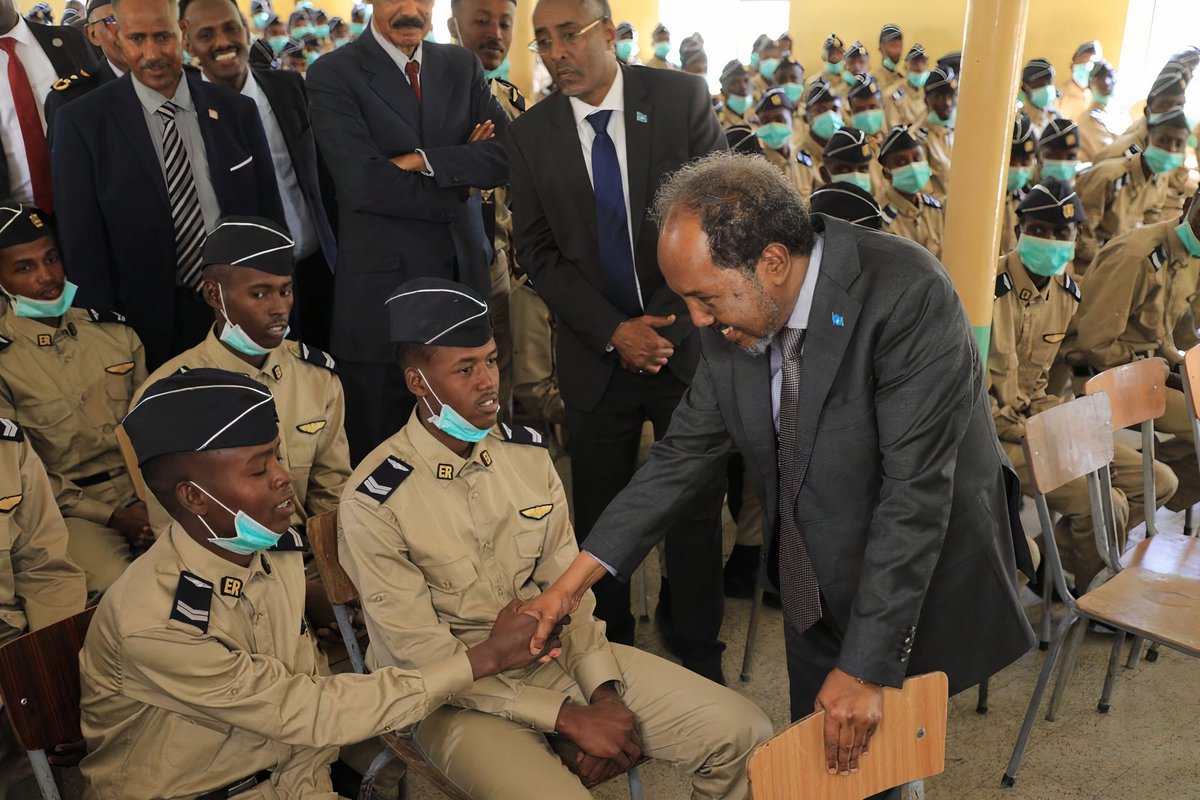 TheVillaSomalia's tweet photo. H.E @HassanSMohamud, accompanied by H.E President Isaias Afwerki, paid a visit to SNA Air Force cadets who are undergoing training in Eritrea. The President commended the officers' tenacity during training and thanked Eritrea for its support in training the #SNA. https://t.co/HA1RdrPmcI
