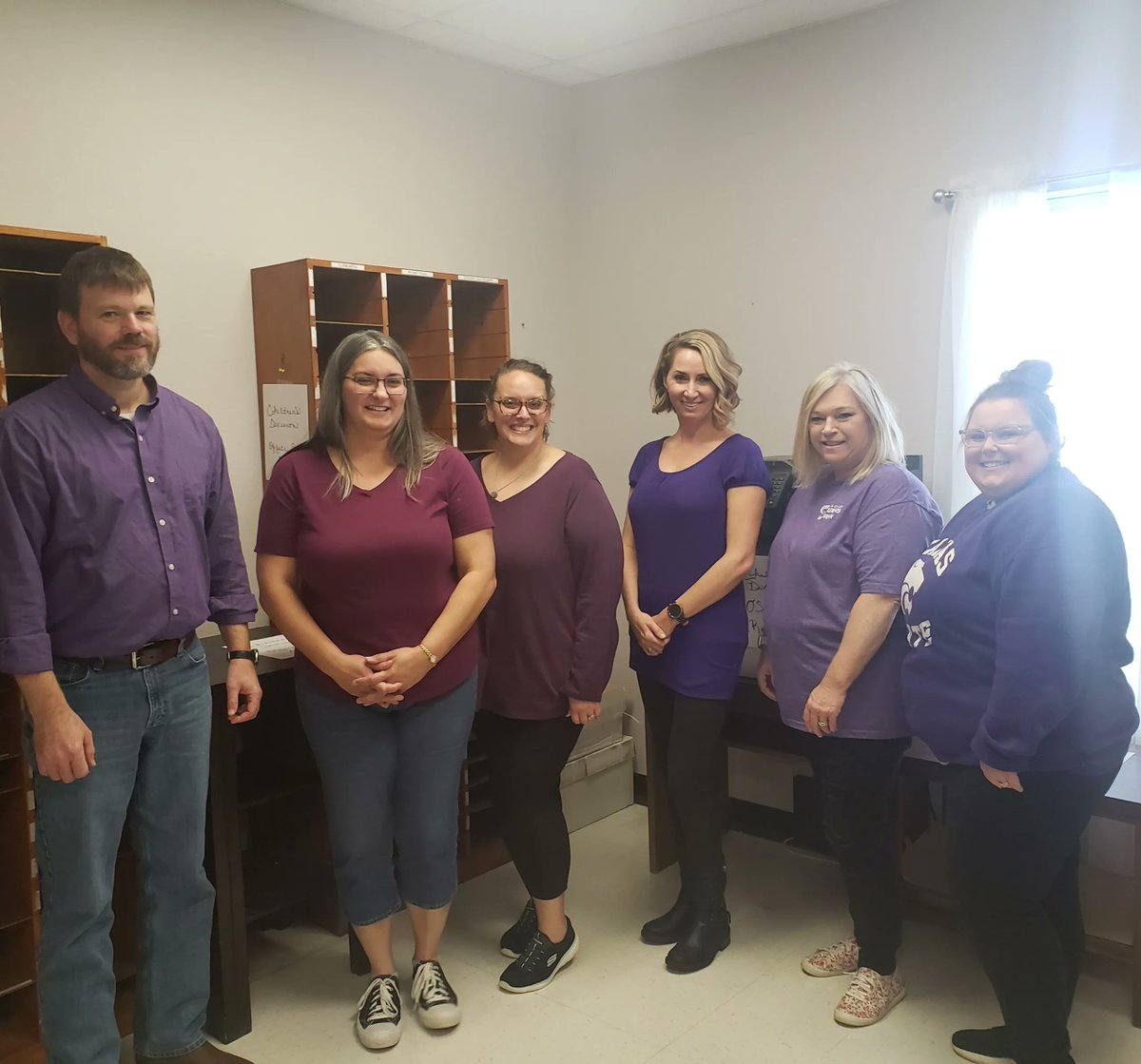 DSS_Missouri's tweet photo. DSS team members showed up wearing purple for adoption yesterday! Johnson County Children's Division Office even got to participate in 8 adoptions on National Adoption Day! #NationalAdoptionMonth #AdoptMOKids https://t.co/WSr9PQ8QK5